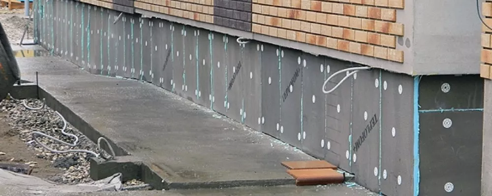 Утепление фундамента панелями